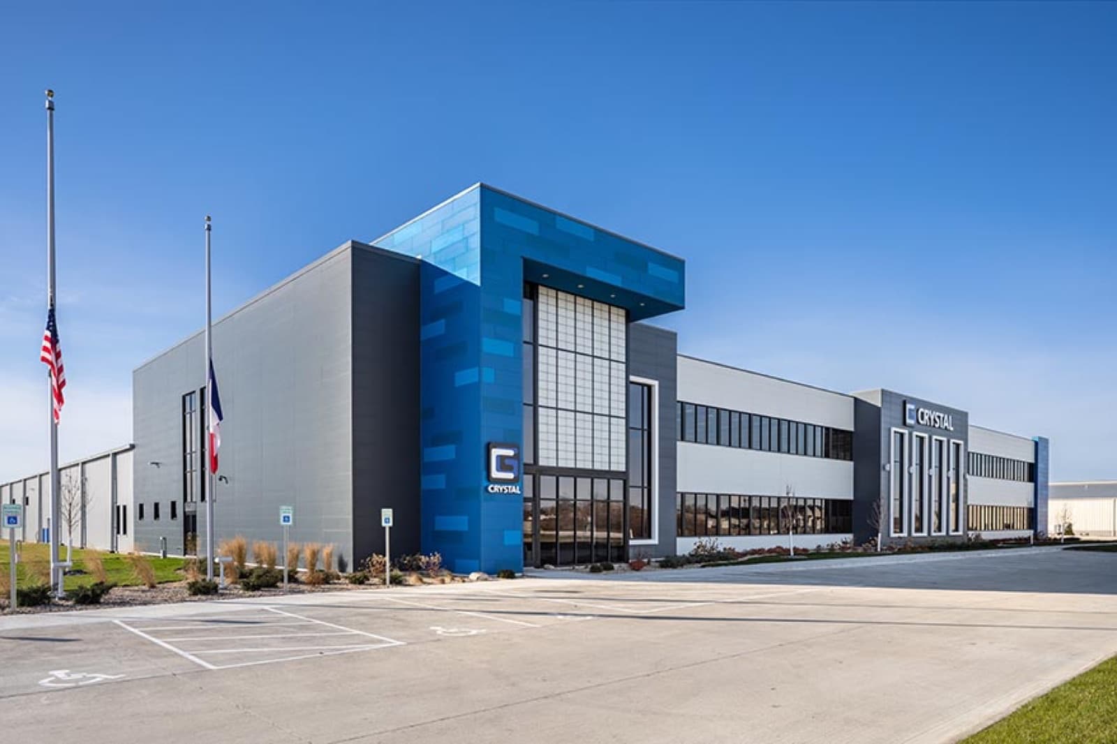 Haven-delivered corporate facility exterior, twilight
