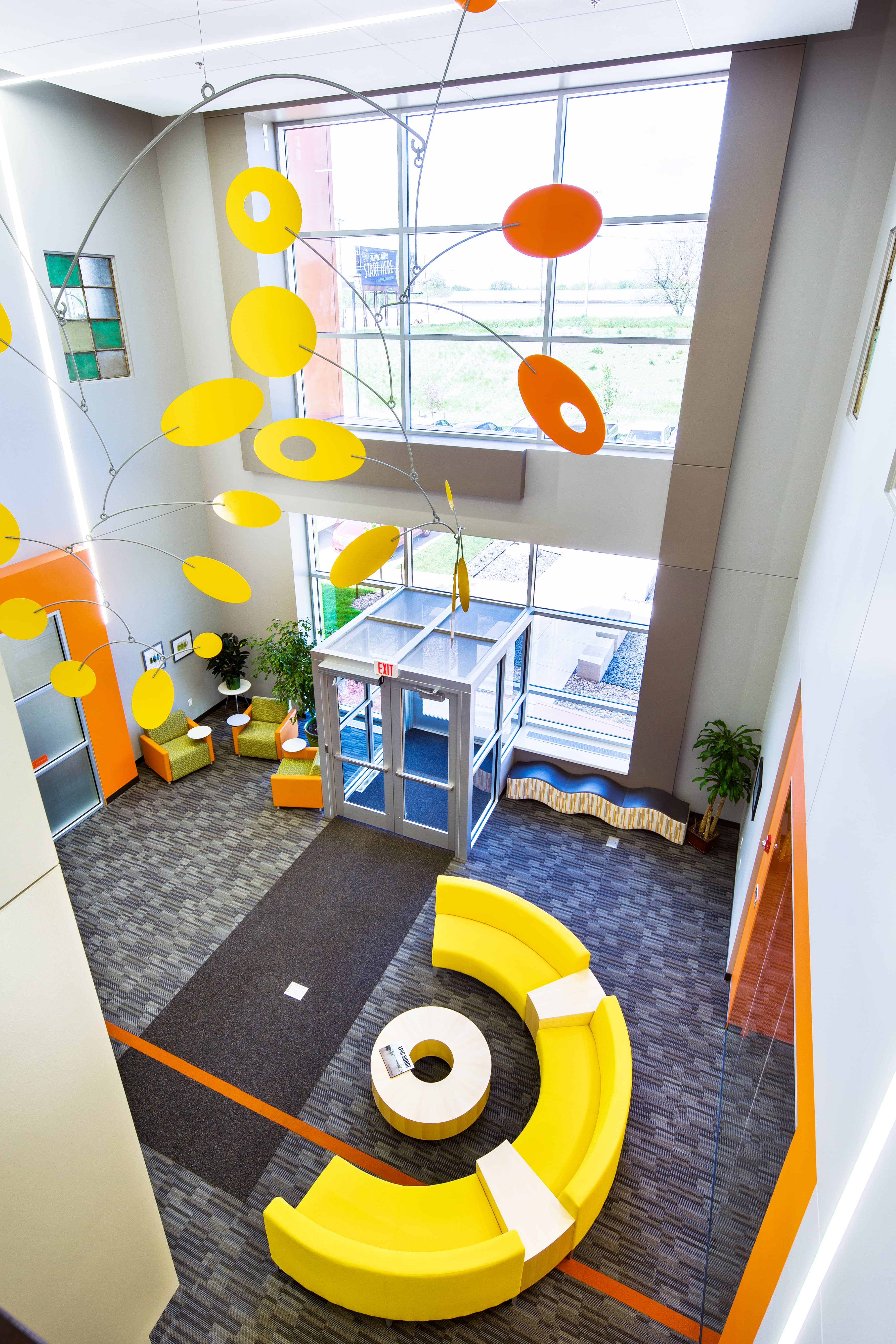 Aerial view of a Haven-delivered facility lobby — Calder mobile, branded interior